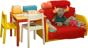 Sessel mit Teddybär und Spielecke